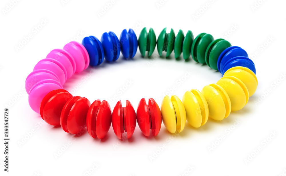 Obraz premium Bright magnets on white background