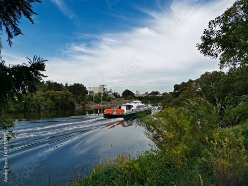 Beautiful view of a river with reflections trees, deep blue sky and light clouds on water, Parramatta river, Rydalmere, Sydney, New South Wales, Australia
 photo