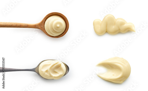 Set of Mayonnaise sauce in spoons top view isolated on white background