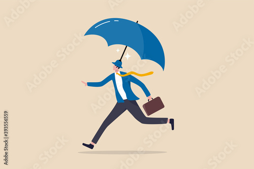 Insurance and protection, safety and security or business shielding or shelter to protect in economic crisis concept, confidence businessman entrepreneur wearing hat with strong umbrella running safe.