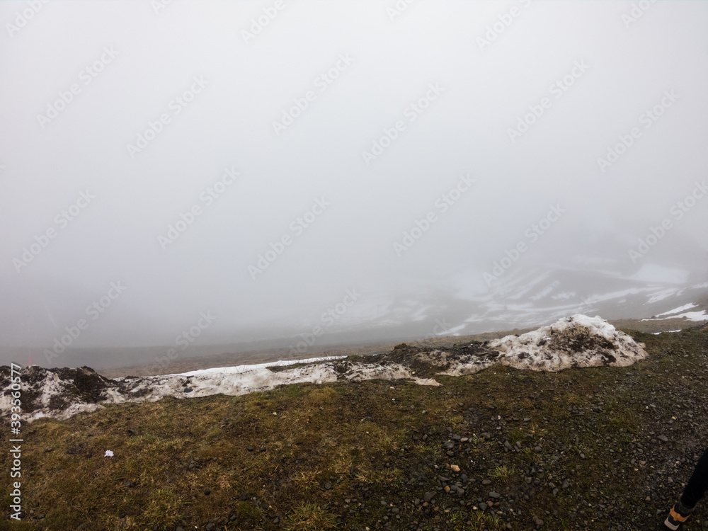 Snow and fog in the french Pyrenees near the Luchon Superbagnères Ski Resort in the Arrondissement of Saint-Gaudens, Occitania, Haute-Garonne, France. The Luchonnais Mountains view. Snow and fog in the french Pyrenees near the Luchon Superbagnères Ski Resort in the Arrondissement of Saint-Gaudens, Occitania, Haute-Garonne, France. The Luchonnais Mountains view.