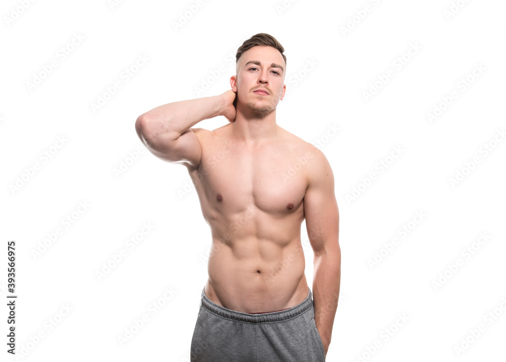 Muscular and fit bodybuilder shirtless torso isolated on white Muscular and fit bodybuilder shirtless torso isolated on white