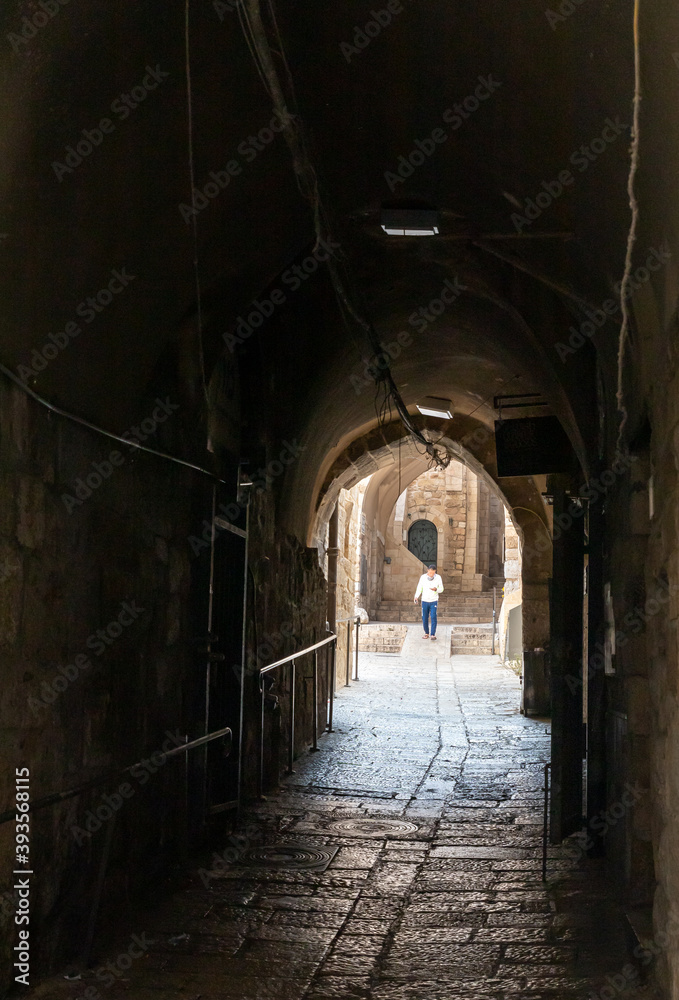 Pedestrian  tunnels under buildings on the Shaar ha-Shalshelet Street in the old city of Jerusalem in Israel
