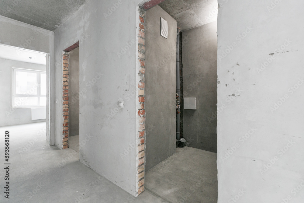 Fototapeta premium interior of the apartment without decoration in gray colors