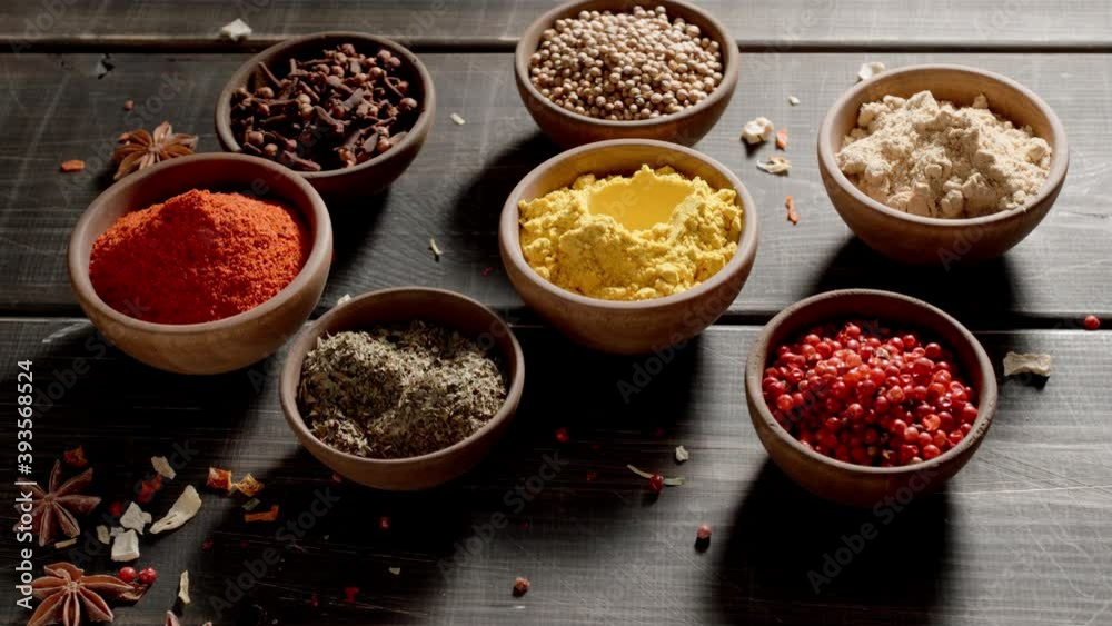 Spices and herbs. Variety of colourful seasoning on a table. Chef cooking. Spices and herbs. Variety of colourful seasoning on a table. Chef cooking.