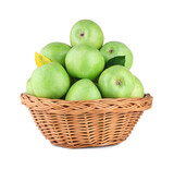 Green apples in basket isolated on the white background