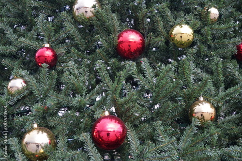 christmas tree with multi-colored balls and decorations background