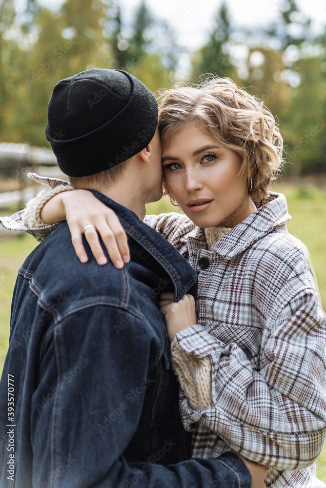 young couple in love in nature in autumn. romantic relationships between men and women young couple in love in nature in autumn. romantic relationships between men and women