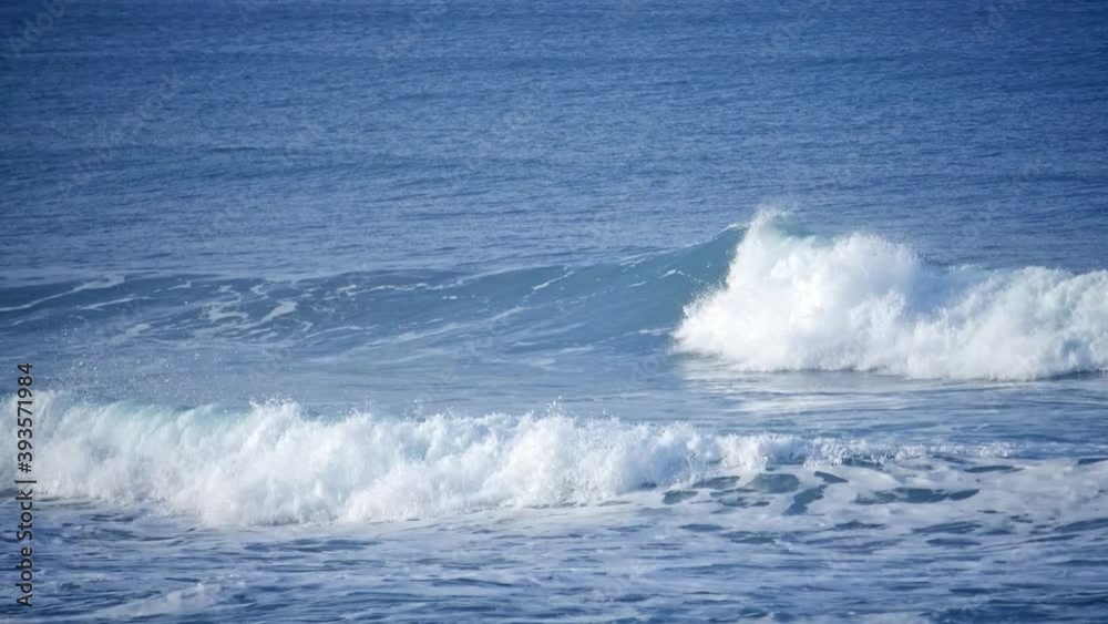Rolling waves on the blue sea, tracking shot Rolling waves on the blue sea, tracking shot