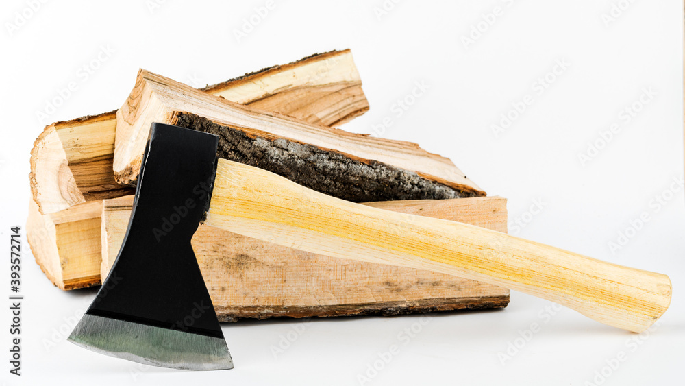 Firewood and an axe on a white isolated background. Renewable energy resource. Ecological concept
