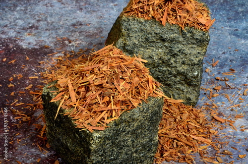 Catuaba bark  on stone cubes. Natural herbal tea from Catuaba tree bark, natural aphrodisiac from Brasilia photo