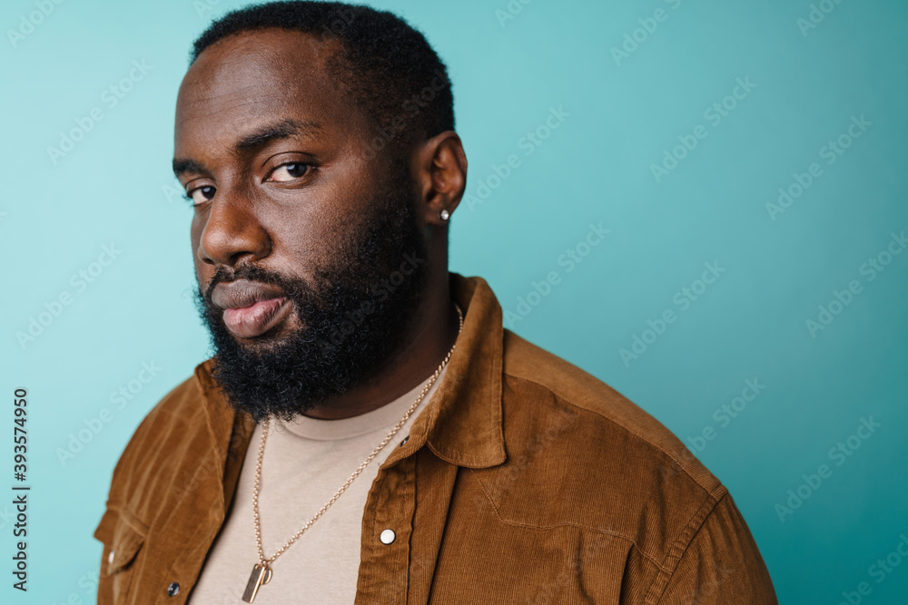Handsome african american man posing and looking at camera Handsome african american man posing and looking at camera