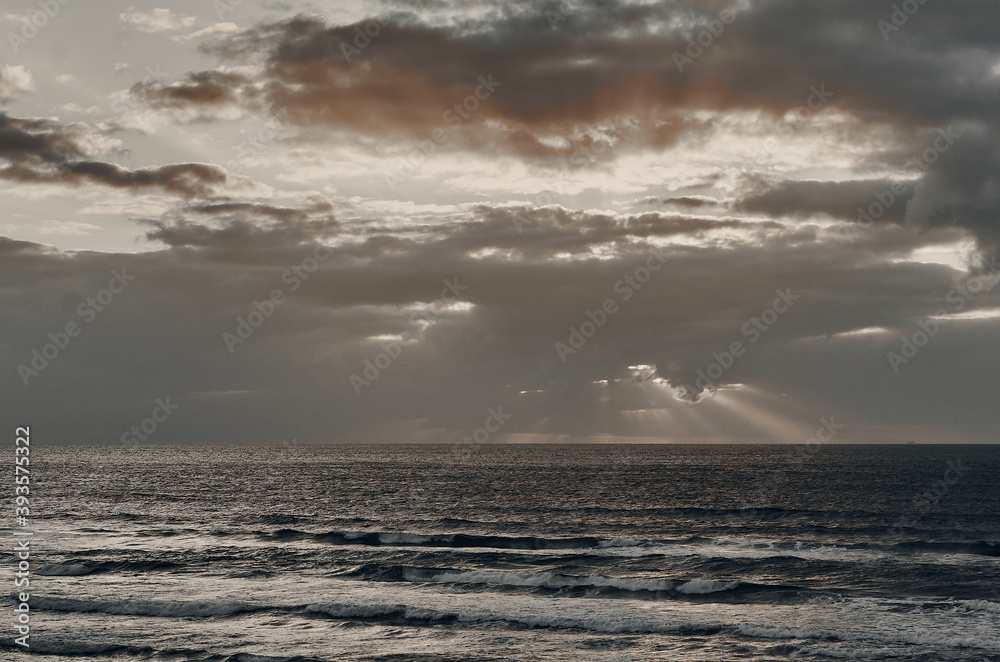 Obraz premium Clouds over the sea