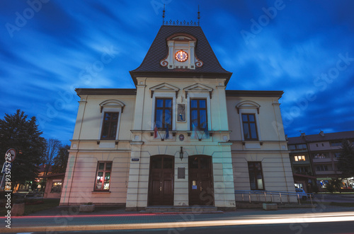 Lesko town hall at evening photo