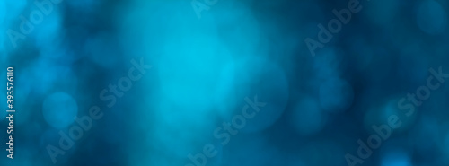 blue abstract background banner with lights and bokeh effect photo