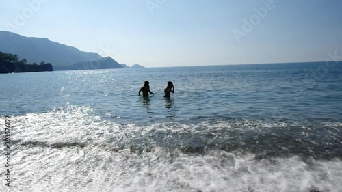 Children swim in the sea. Turkish Riviera Mediterranean coast of Antalya Province in Turkey.