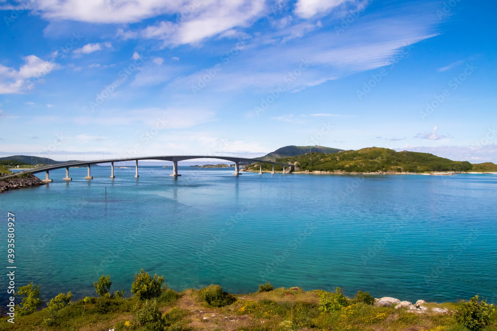 Bridge over vivid blue ocean in Northern Norway