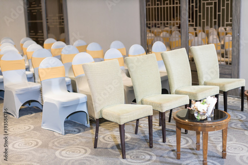chair set for wedding or another catered event dinner.  wedding chair decoration. © kanpisut