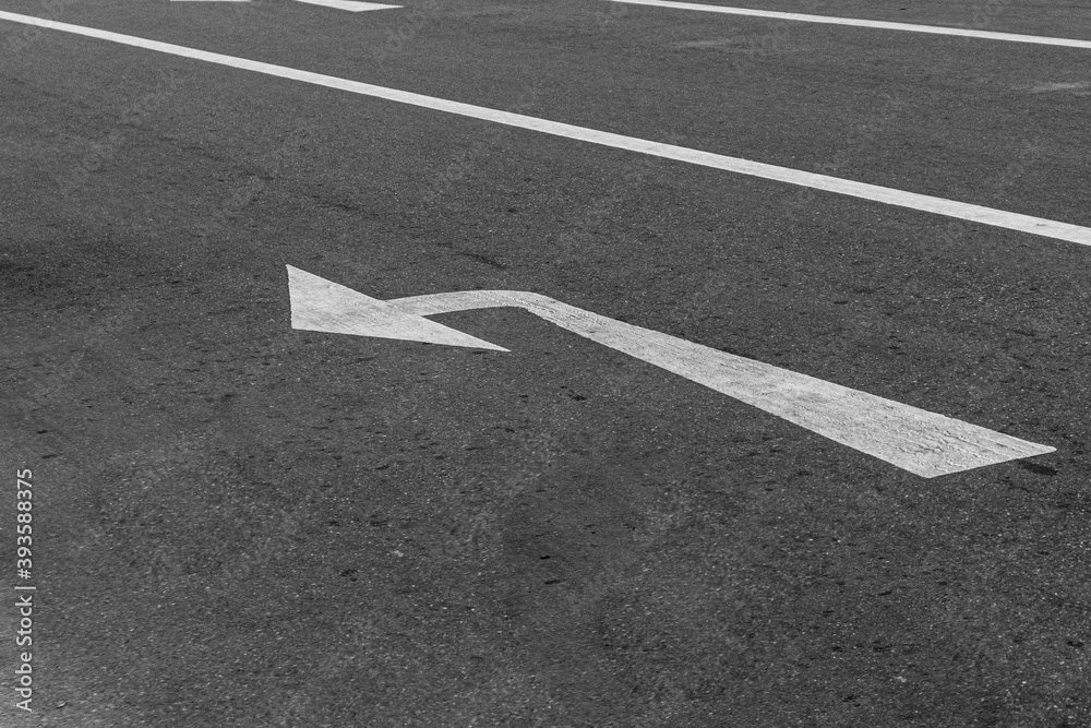Left turn mark on asphalt road in the city. Left turn mark on asphalt road in the city.
