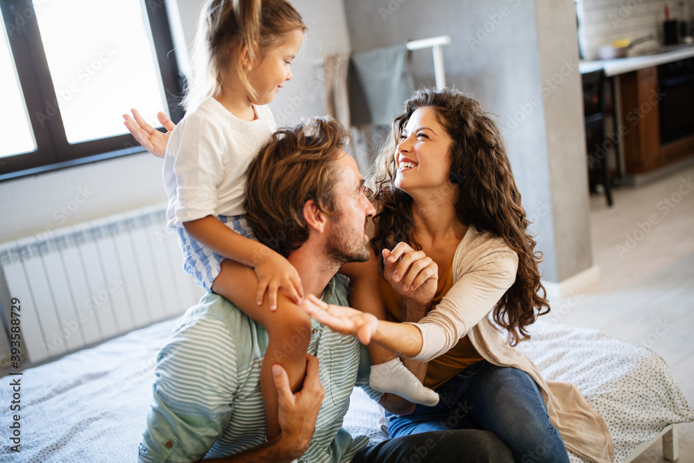 Happy family having fun times at home Happy family having fun times at home