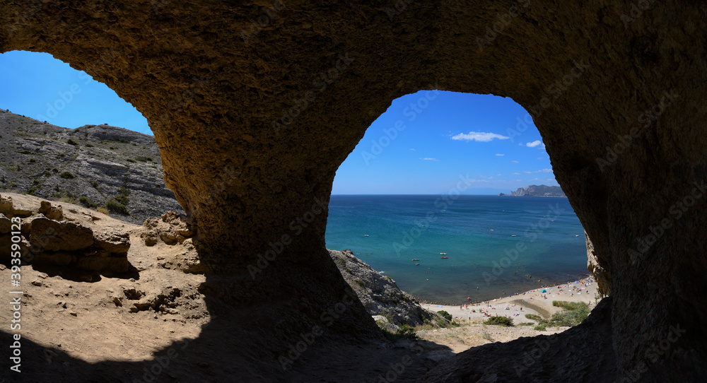 exit from the cave with sea view, Aeolian harp, arch in the rock with sea view panorama