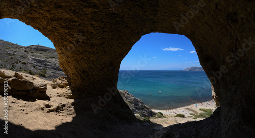 exit from the cave with sea view  Aeolian harp  arch in the rock with sea view panorama