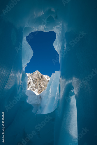 Looking out of a glacier crevasse of The Tasman Glacier (Haupapa) which is the largest glacier in the Southern Alps, South Island, New Zealand.  photo