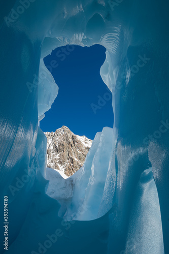 Looking out of a glacier crevasse of The Tasman Glacier (Haupapa) which is the largest glacier in the Southern Alps, South Island, New Zealand.  photo