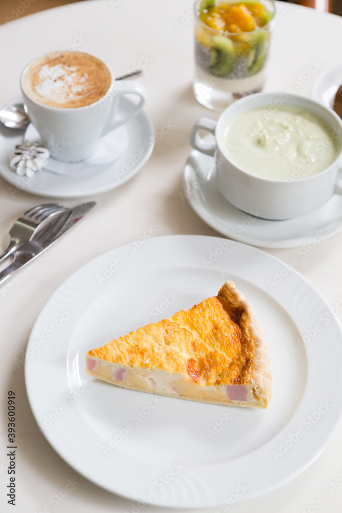 Traditional french quiche pie served for lunch Traditional french quiche pie served for lunch