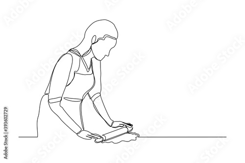 Continuous line drawing of chef woman rolling bakery pizza dough use wooden rolling pins. One line concept of bake receipt cooking. Vector illustration