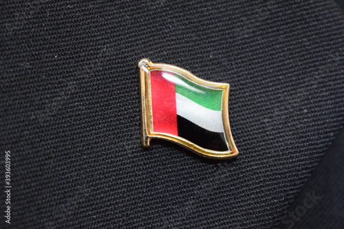 United Arab Emirates (UAE) flag lapel pin on a suit
