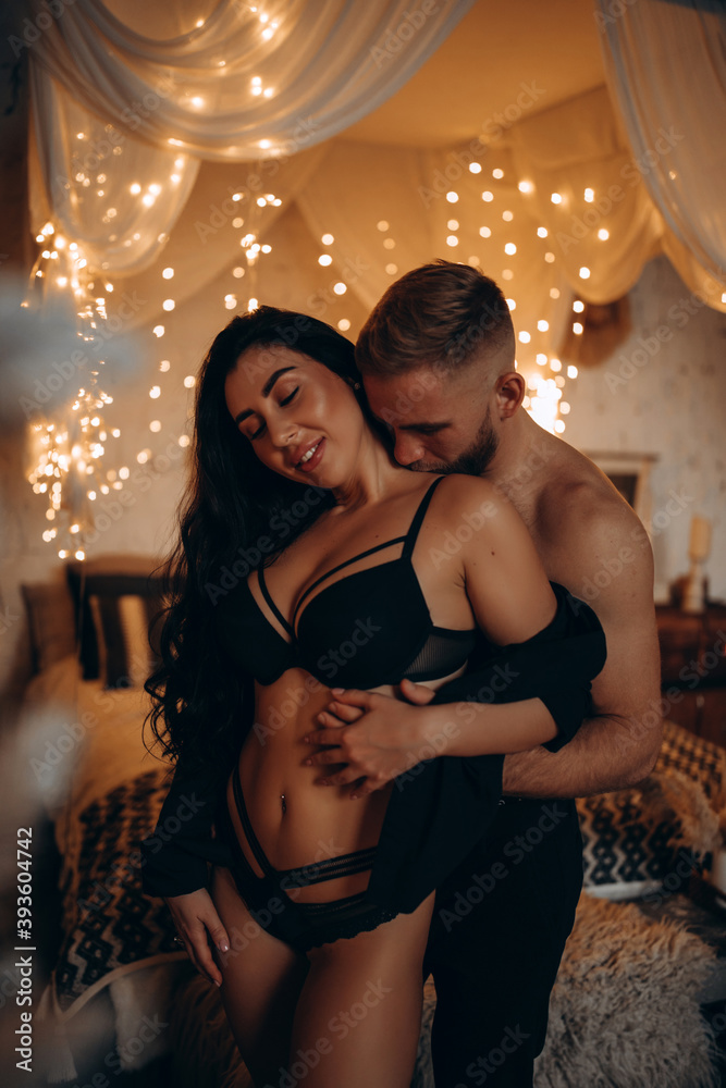 An incendiary story of a couple in love in the New Year. The guy and the girl spend time together. New Year's love story in a cozy home environment.
