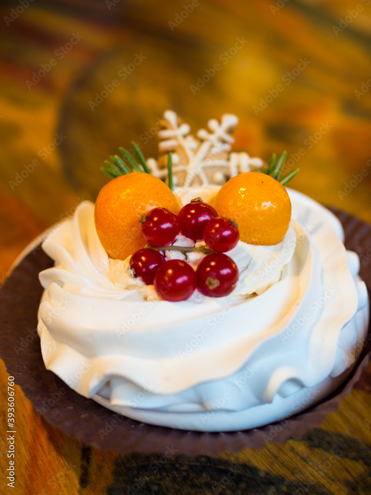 Christmas delicious cakes decorated with a gingerbread snowflake, cranberries, physalis. Christmas delicious cakes decorated with a gingerbread snowflake, cranberries, physalis.