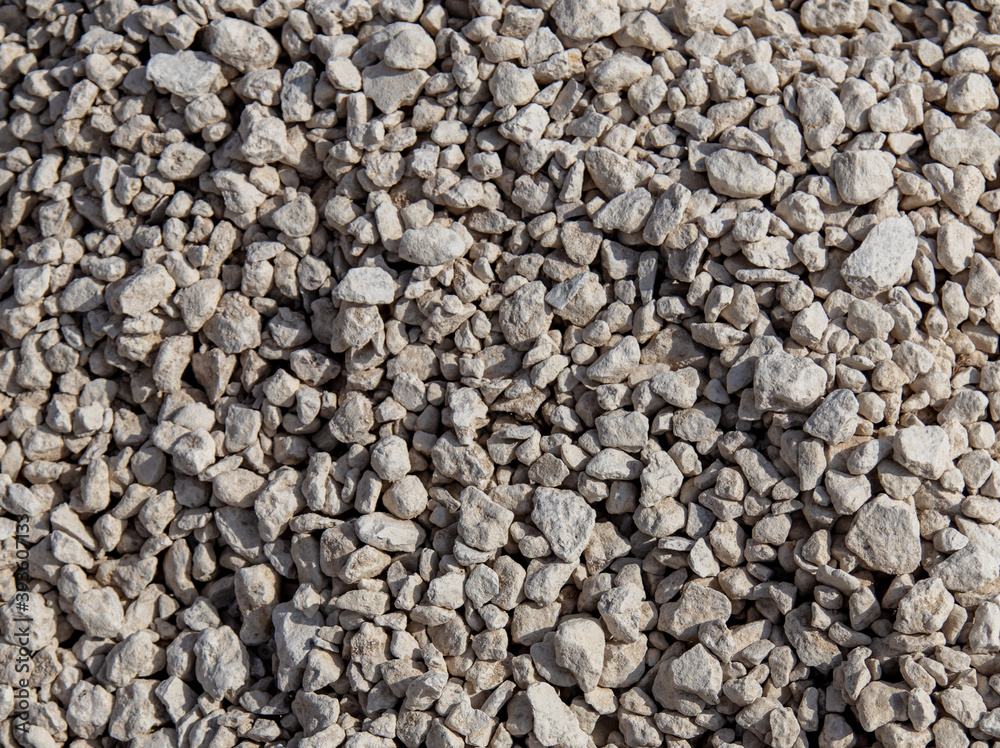 Stone gravel at a construction site as a background. Stone gravel at a construction site as a background.