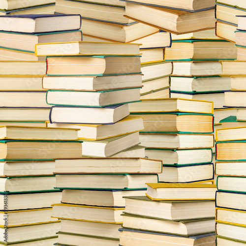 Stack of books and textbooks, seamless pattern for the background.