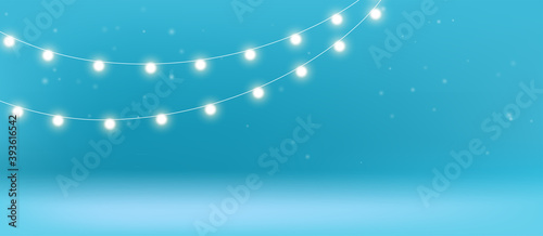 Christmas garlands on blue background. Winter banner