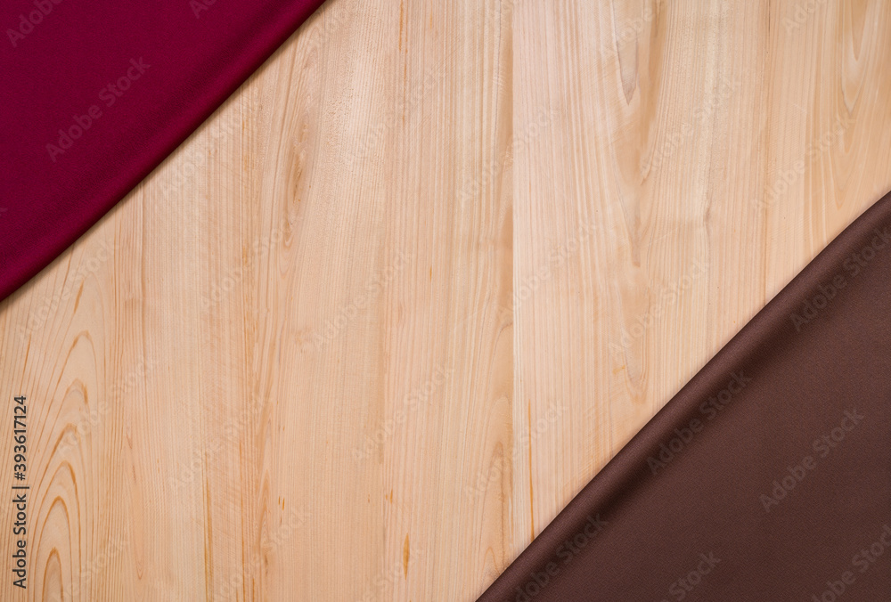 Top view of hand towel and wooden texture background Top view of hand towel and wooden texture background