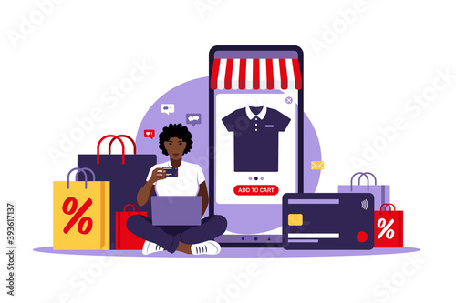 African woman online shopping. Black friday. Pay with credit card. Sale. Modern concept for web. Vector illustration. Flat style.