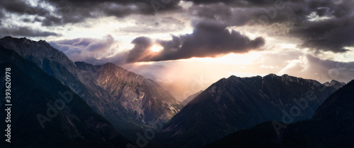 Aerial Panoramic View of Remote Canadian Mountain Landscape. Dramatic Colorful Sunset Art Render. Located near Pemberton, British Columbia, Canada. Nature Panorama Background.