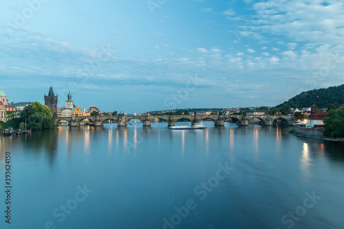 Vltava river with Charles Bridge  Czech  Karluv most  in the evening.