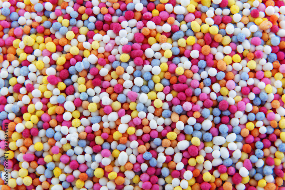hundreds and thousands sprinkles tiny sugar beads for decorating cakes and desserts background texture hundreds and thousands sprinkles tiny sugar beads for decorating cakes and desserts background texture