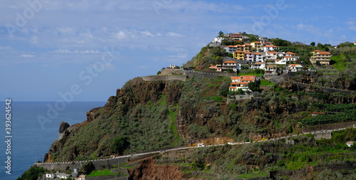 Fototapeta Naklejka Na Ścianę i Meble -  Hillside houses in Ribeira Brava, Madeira Island, Portugal