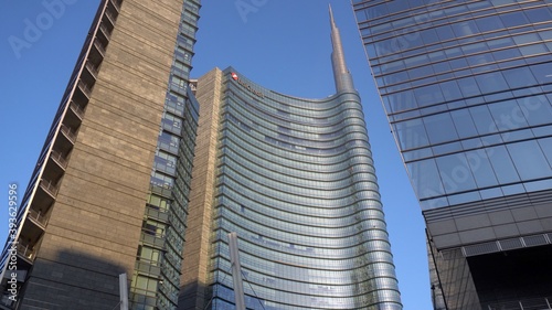 Italy , Milan , 11/19/202 - Gae Aulenti square and Unicredit Tower in   Downtown of the city empty of people during covid-19 Coronavirus outbreak epidemic quarantine home - lockdown  photo
