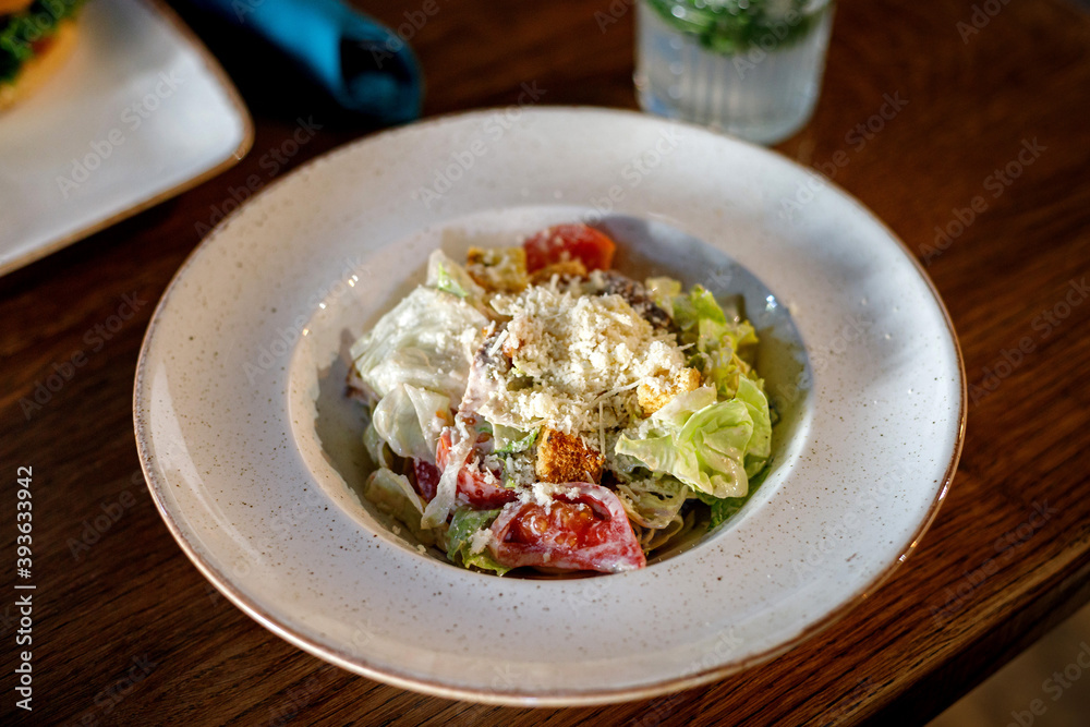 Fresh Caesar salad on a plate Fresh Caesar salad on a plate