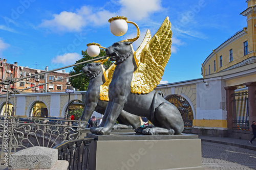 The Bank bridge was built in 1825-1826 by engineer Wilhelm von Tretter. The bridge is decorated with statues of winged lions by sculptor Pavel Sokolov. Russia, Saint Petersburg, September 2020 photo