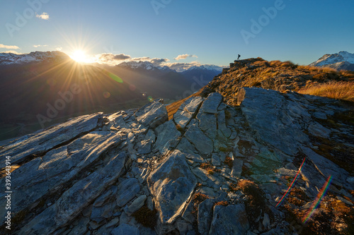 Hiker on top of Mount Alfred Glenorchy, South Island, New Zealand. photo