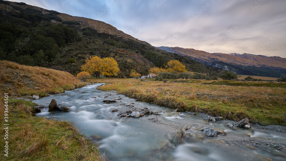 River flowing in Autumn. Rees Valley, South Island, New Zealand. River flowing in Autumn. Rees Valley, South Island, New Zealand.