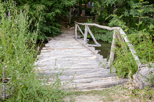 bridge of logs across the stream