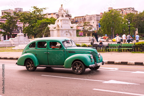 green classic car on the streets of havana cuba © Michael Barkmann