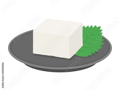 皿にのせた豆腐のイラスト